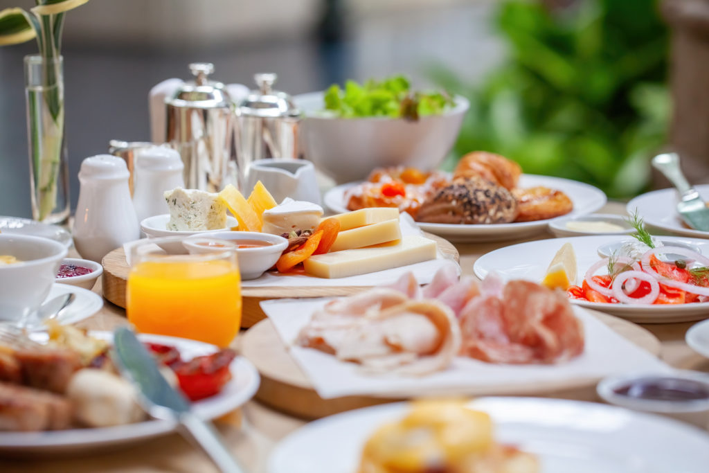 Table full of various fresh brunch food Table full of various fresh brunch food